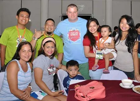 Daniel talking with some VPs and their family